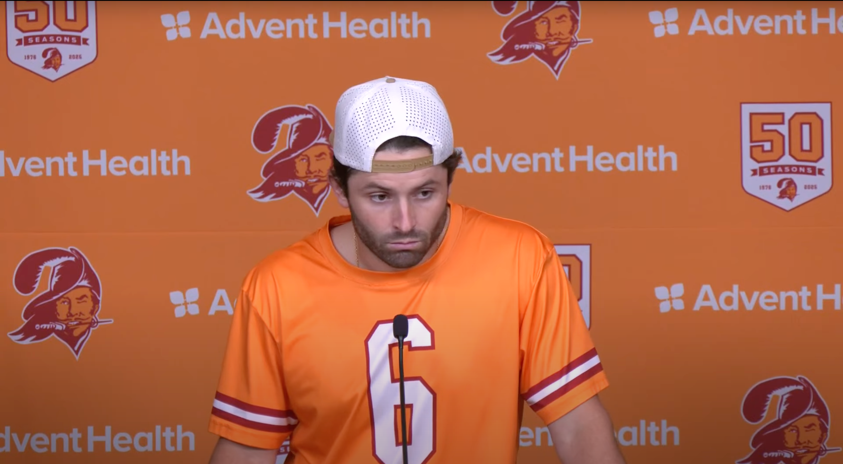 Baker Mayfield speaks to reporters after practice.